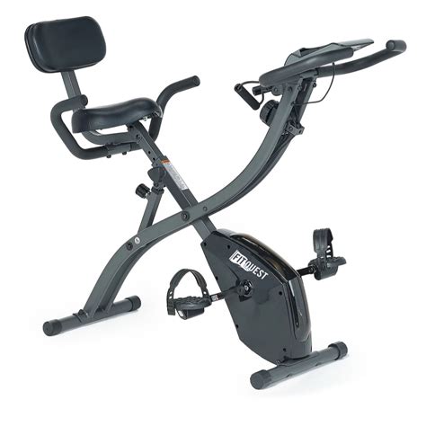 Straddle the book, spine up, as if you were sitting on a saddle. . Fit quest bike